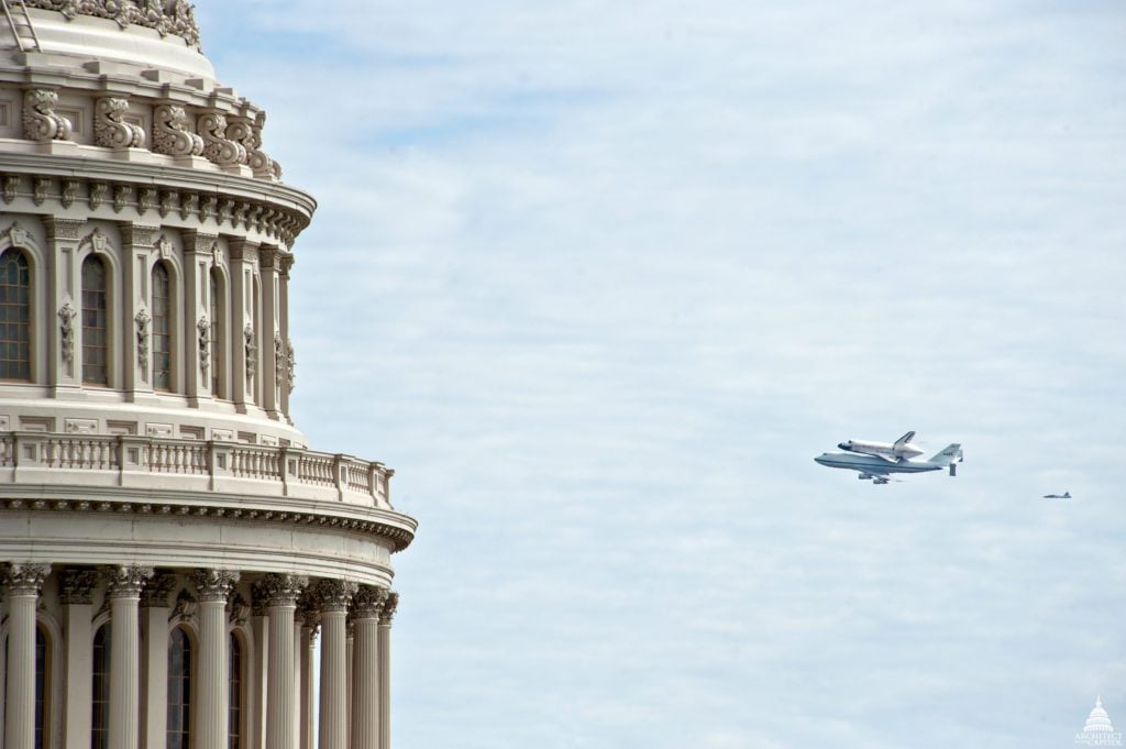 Space Shuttle Discovery over Washington, DC